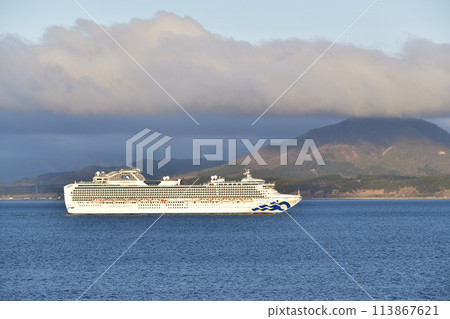 Photographing the cruise ship Diamond Princess sailing through Hakodate Bay in Hakodate, Hokkaido in spring 113867621