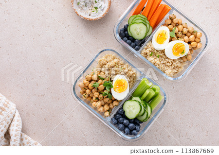 Vegetarian lunch meal prep containers high protein with quinoa, herbed chickpeas, vegetables and eggs Vegetarian lunch meal prep containers high protein with quinoa, herbed chickpeas, vegetables and eggs 113867669