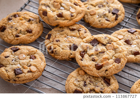 Chocolate chip cookies with chocolate chunks and caramel chips 113867727
