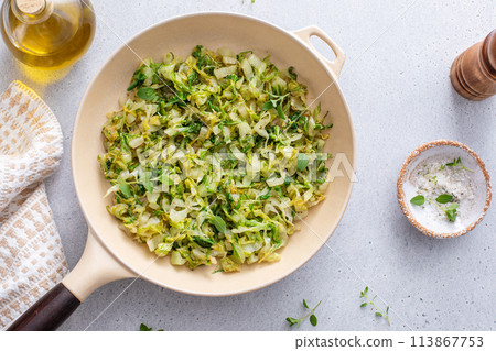 Sauteed cabbage in a cast iron pan, side dish idea 113867753
