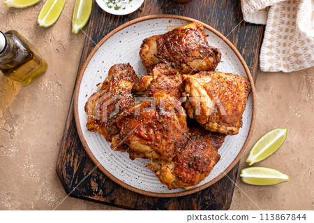 Chicken thighs roasted or air fried with paprika and lime 113867844
