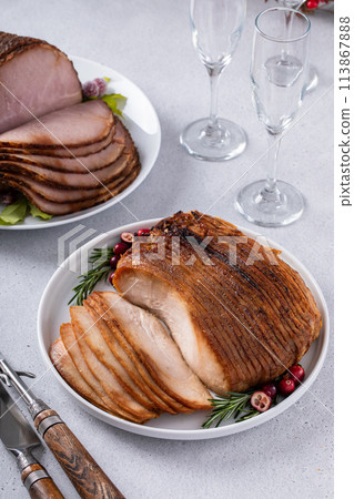 Oven roasted turkey breast thinly sliced with side dishes for a celebration dinner Oven roasted turkey breast thinly sliced with side dishes for a celebration dinner 113867888