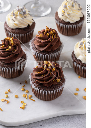 Festive cupcakes for a New Years Eve party Festive cupcakes for a New Years Eve party 113867902