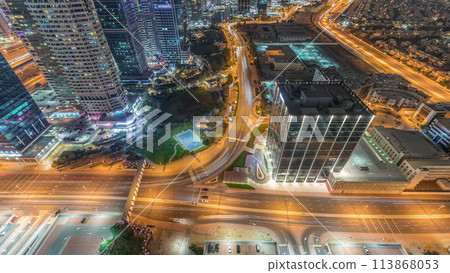 Traffic on the road in Jumeirah Lakes Towers district aerial night timelapse. Traffic on the road in Jumeirah Lakes Towers district aerial night timelapse. 113868053