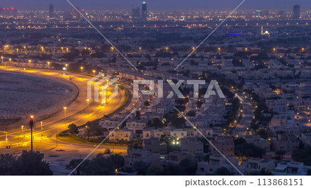 Aerial view to villas and houses near Golf course night to day timelapse 113868151