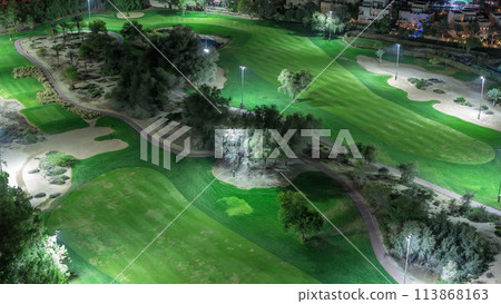 Aerial view to Golf course and villas with houses night timelapse 113868163