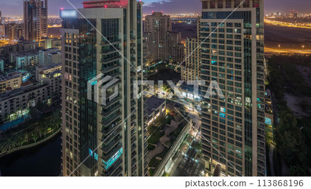 Greens district aerial view from top night to day timelapse. Greens district aerial view from top night to day timelapse. 113868196