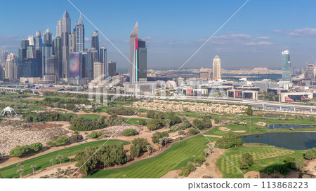 Dubai Marina skyscrapers and golf course morning timelapse, Dubai, United Arab Emirates 113868223