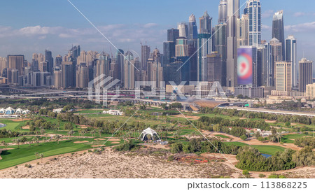 Dubai Marina skyscrapers and golf course morning timelapse, Dubai, United Arab Emirates 113868225