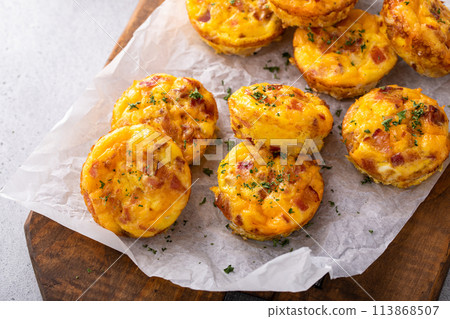 Breakfast egg muffins or egg bites with bacon and cheddar Breakfast egg muffins or egg bites with bacon and cheddar 113868507