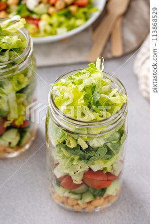 Salad in a jar with vegetables and chickpeas 113868529