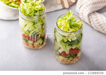 Salad in a jar with vegetables and chickpeas Salad in a jar with vegetables and chickpeas 113868530
