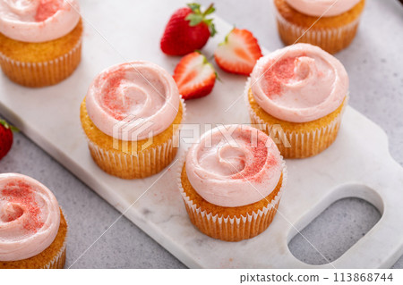 Strawberry lemonade cupcakes with a swirl of cream cheese frosting Strawberry lemonade cupcakes with a swirl of cream cheese frosting 113868744