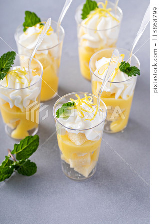 Lemon curd layered dessert shots for a party Lemon curd layered dessert shots for a party 113868799