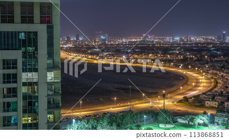 Aerial view to villas and houses with Golf course night timelapse 113868851