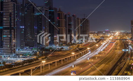 Aerial top view to Sheikh Zayed road near Dubai Marina and JLT night to day timelapse, Dubai. 113868904