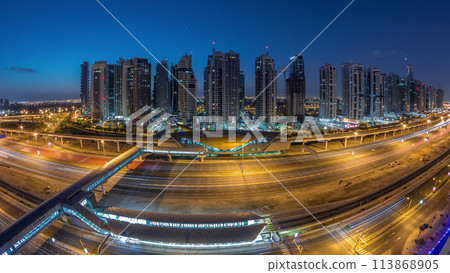 Aerial top view to Sheikh Zayed road near Dubai Marina and JLT night to day timelapse, Dubai. 113868905