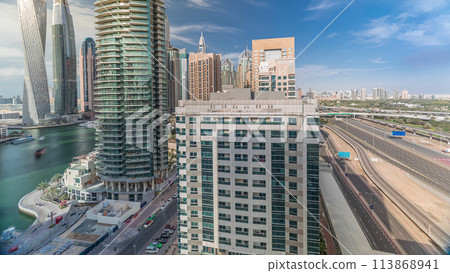 Aerial top view to Sheikh Zayed road near Dubai Marina timelapse, Dubai. 113868941