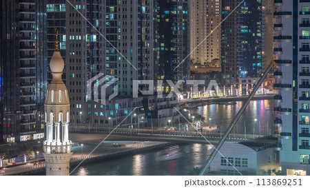 Dubai Marina skyscrapers and promenade aerial night timelapse, Dubai, United Arab Emirates Dubai Marina skyscrapers and promenade aerial night timelapse, Dubai, United Arab Emirates 113869251