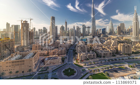 Dubai Downtown skyline timelapse with Burj Khalifa and other towers panoramic view from the top in Dubai Dubai Downtown skyline timelapse with Burj Khalifa and other towers panoramic view from the top in Dubai 113869371