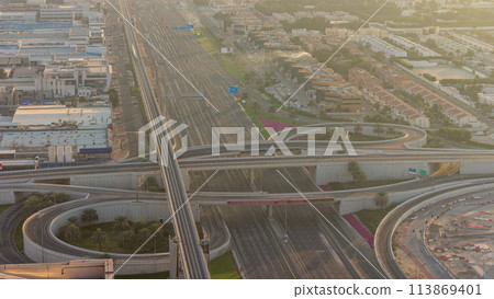 Sheikh Zayed Road with intersection aerial timelapse, Dubai, United Arab Emirates. Sheikh Zayed Road with intersection aerial timelapse, Dubai, United Arab Emirates. 113869401