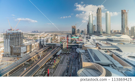Aerial view of Financial center road timelapse with under construction building 113869425