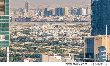 Dubai marina and JLT skyscrapers aerial skyline during sunset timelapse. 113869567