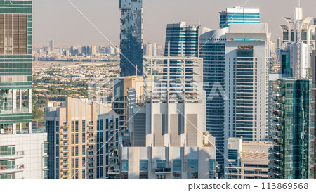 Dubai marina and JLT skyscrapers aerial skyline during sunset timelapse. 113869568