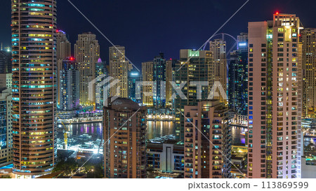 Fantastic rooftop skyline of Dubai marina timelapse. Fantastic rooftop skyline of Dubai marina timelapse. 113869599