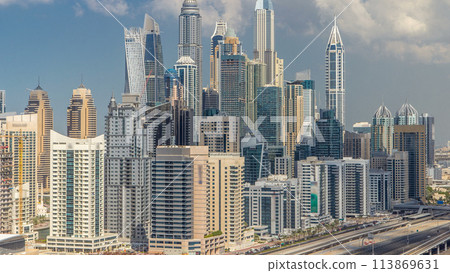 Dubai Marina skyscrapers aerial top view with clouds from JLT in Dubai timelapse, UAE. Dubai Marina skyscrapers aerial top view with clouds from JLT in Dubai timelapse, UAE. 113869631