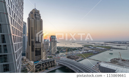 JBR and Dubai marina after sunset aerial day to night timelapse 113869661