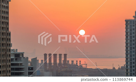 Aerial view of Dubai Marina from a vantage point at sunset timelapse. Aerial view of Dubai Marina from a vantage point at sunset timelapse. 113869744