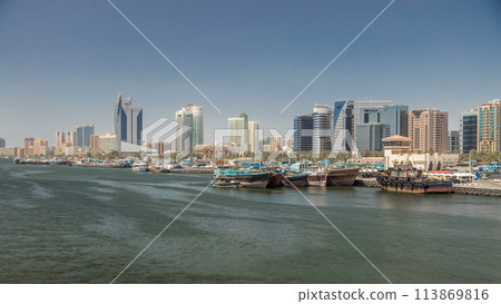 Trading wooden boats in the port timelapse. Merchant ships on the Creek Canal. 113869816