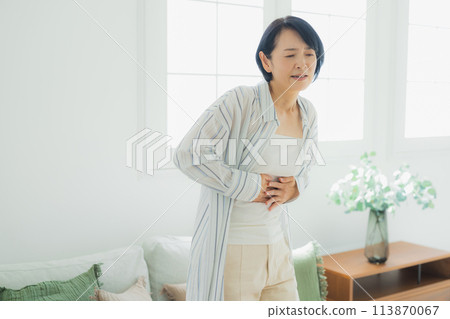 A middle-aged woman in poor health 113870067