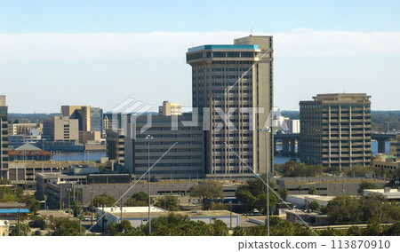 Aerial view of Jacksonville city with high office buildings. View from above of USA glass and steel high skyscraper architecture in modern american midtown 113870910