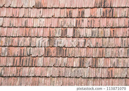 Closeup surface of old weathered ceramic tiles covering building roof 113871070