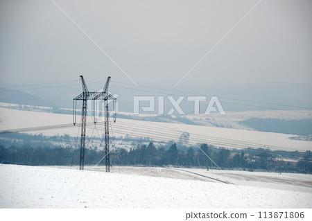 High voltage tower with electric power lines transfening electrical energy through cable wires 113871806