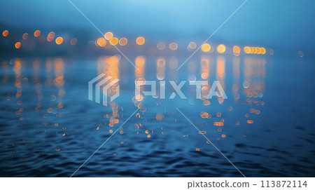 Orange light bokeh reflected on blue water surface AI image 113872114
