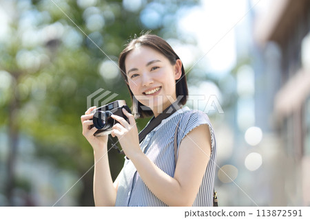 Camera woman travel solo travel 113872591