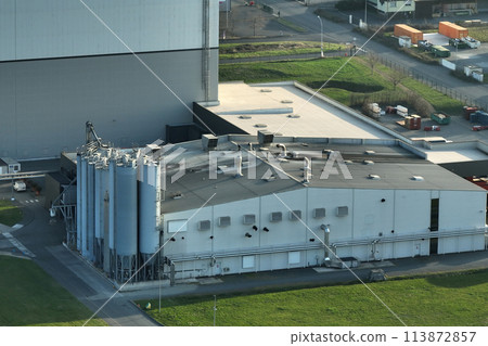 Aerial view of modern factory structure for production and distribution of industrial equipment. Concept of global industry 113872857