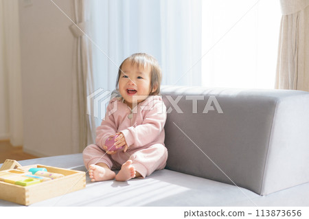 Baby playing with building blocks Baby playing with building blocks 113873656