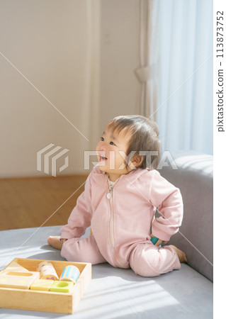 Baby playing with building blocks 113873752