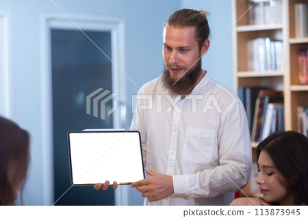 Man showing blank digital tablet isolated white screen. empty mock up copy space 113873945