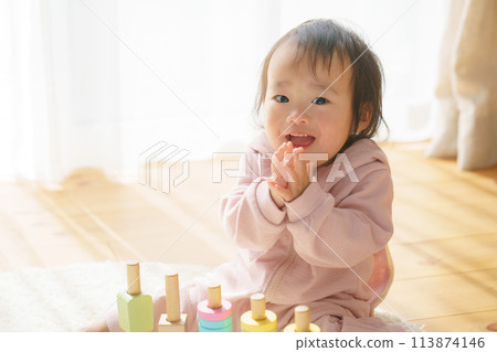Baby playing with building blocks 113874146