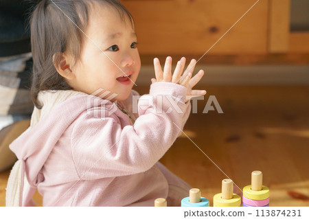 Baby playing with building blocks 113874231