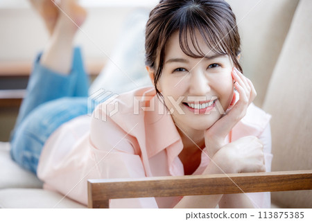 Woman living alone Woman living alone 113875385