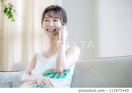 Female living alone smartphone 113875440