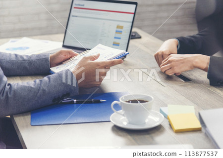 Happiness two businessman working together confident team meeting in office desk. Team business man partners working with laptop startup company. Asian man colleague friendship at work staff meeting Happiness two businessman working together confident team meeting in office desk. Team business man partners working with laptop startup company. Asian man colleague friendship at work staff meeting 113877537