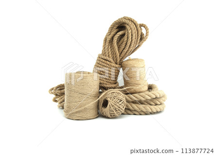 Jute ropes and twines isolated on white background Jute ropes and twines isolated on white background 113877724