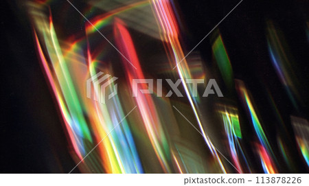 A prism-like distortion of light with intense reds and yellows, creating a fiery, energetic abstract. 113878226